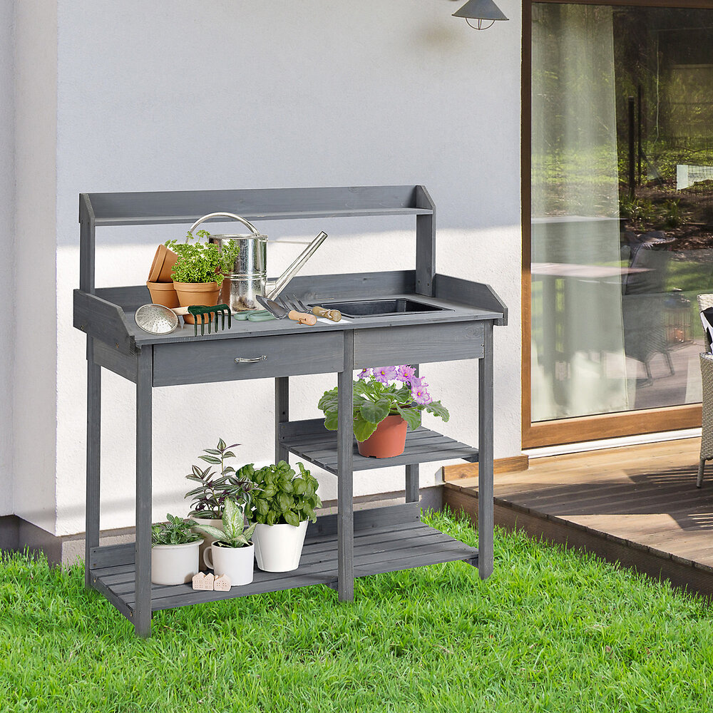 OUTSUNNY - Table de rempotage jardinage multi-équipée - tiroir, 3 étagères, évier, 3 crochets - bois sapin pré-huilé gris - large